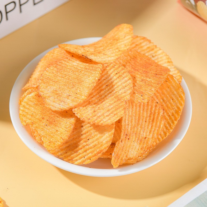 【定制】源头工厂椒香麻辣味薯片休闲零食小吃薄脆鲜切土豆片加工图2