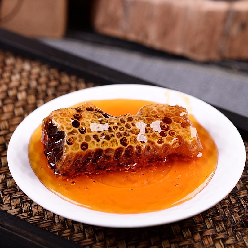 云南蜂蜜源头厂家贴牌野树洞OEM木桶巢蜜 雨林悬崖野蜂巢图4