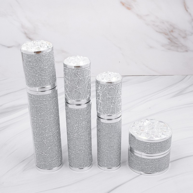 工厂新款钻石片贴皮护肤品套装瓶 30-100ml水乳精华瓶 50g膏霜瓶