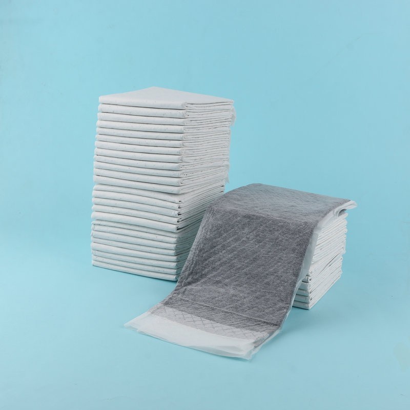 工厂加工一次性狗狗尿垫 加厚竹炭除臭宠物隔尿垫 吸水尿不湿尿片图3