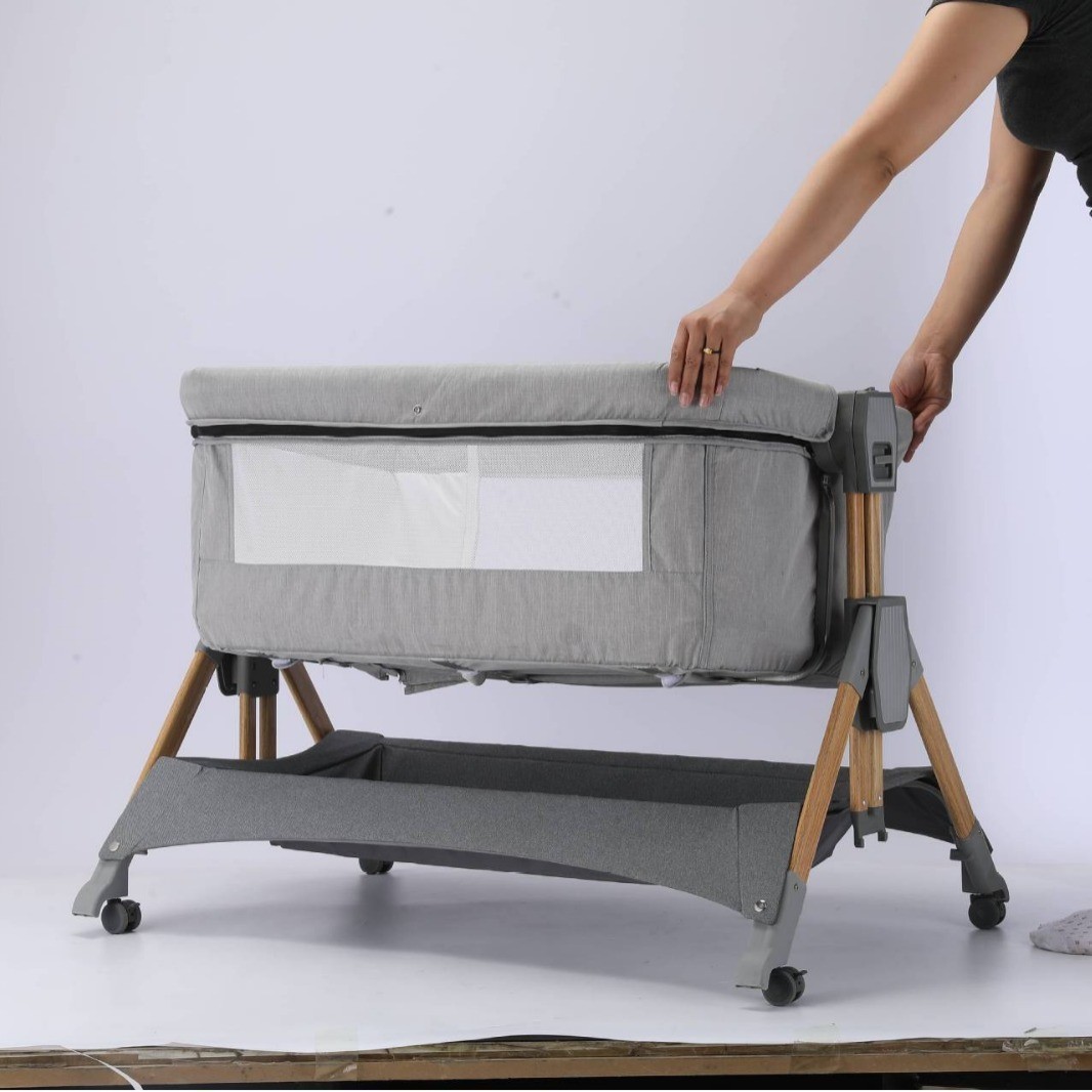 可折叠免安装婴儿床 便携简易操作婴儿床图2