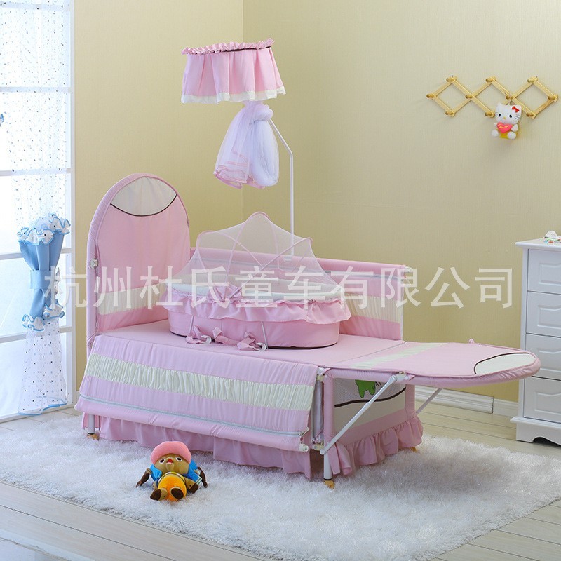 宝宝婴儿床 新生宝贝可加长配摇篮脚轮游戏床可调节带蚊帐图3